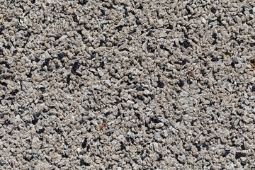 Crushed granite stones wall - close up