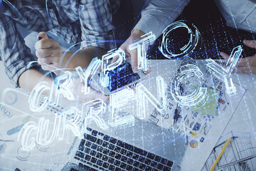 Double exposure of crypto theme drawing and man and woman working together holding and using a mobile device. Blockchain concept.