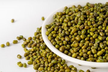 Fresh mung beans on pure white background