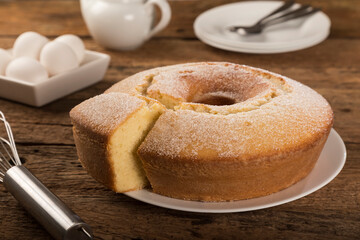 Homemade cake on a rustic wooden table.