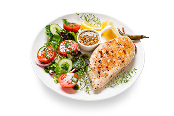 Grilled chicken breast with fresh vegetable salad. Healthy food, keto diet, diet lunch concept. isolated on white background