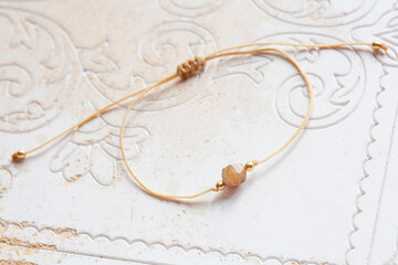 Agate mineral stone bead string jewelry bracelet on white background