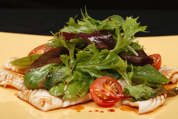 Fried squid with vegetable salad