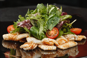Fried squid with vegetable salad