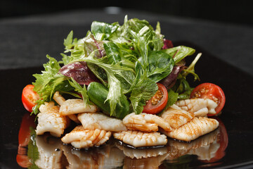 Fried squid with vegetable salad
