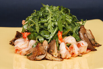 Arugula salad with shrimp and oyster mushrooms