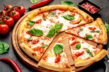 Pizza Margherita on a stone background 