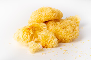 Multiple dried tremella on a pure white background