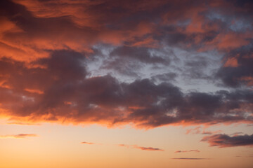 Red sunrise sky. Orange morning light. Dramatic clouds