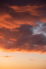 Sky and clouds with red and orange light before sunrise at dawn