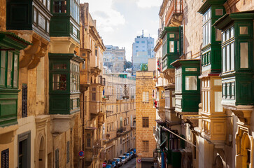 Fototapeta na wymiar typical maltese street in valletta, malta, with balconies