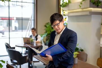 Young men opening files within Modern workspace.