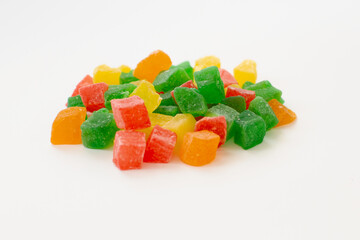 Colorful cubes dry fruit candied peel on white background