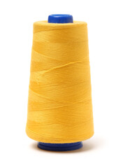 spools of thread for the textile industry on white background