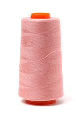 spools of thread for the textile industry on white background