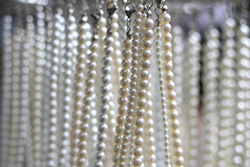 White pearls necklace blurred background