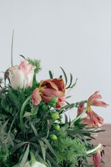 Rotten flowers bouquet, and aging treatment concept. Decay of flower decoration, from fresh to withered flowers