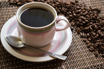 Coffee cup and coffee beans