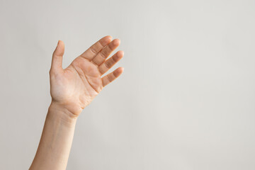 Naklejka premium Hand gestures, to wave Hello. Greeting someone. light grey background