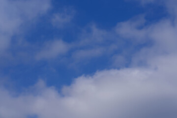 Fototapeta premium Blue sky with clouds at noon.