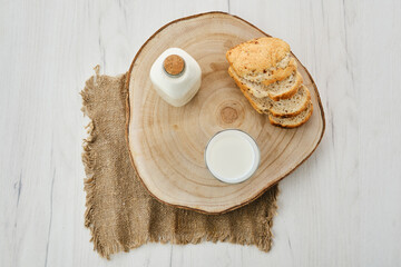 Top view of bottle and a glass of milk