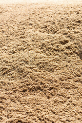 Closeup dry sand pile for construction.