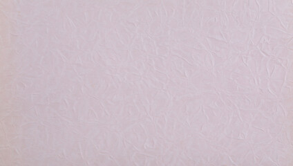 abstract background of crumpled pink wrapping paper
