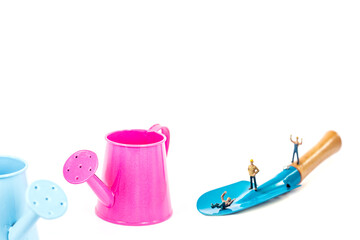 blue and pink watering pot isolate on white background.