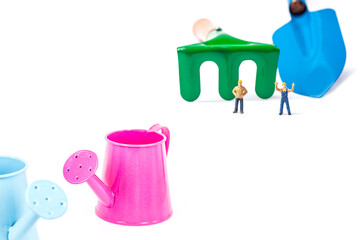 blue and pink watering pot isolate on white background.