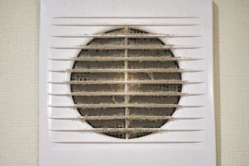 Dirty air ventilation grill of HVAC with clogged filter.