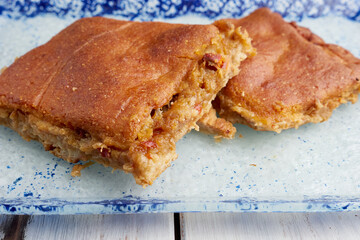two slices of a traditional corn pie on a plate