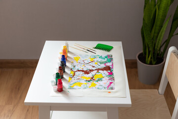 table with paints and tools for drawing in Ebru technique. Traditional Turkish art.