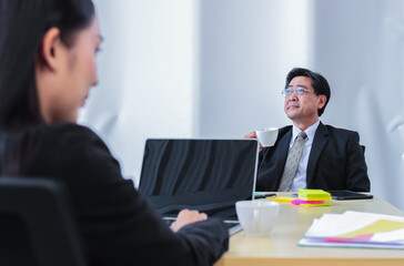 asian group meeting business people. Senior tranning Asian Businessman. Group discussion. Happy faces of suitma. Working for success in office.