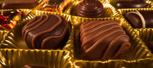 A box of chocolates pralines in close-up view - food photography