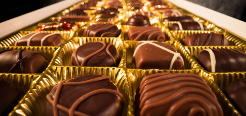 A box of chocolates pralines in close-up view - food photography