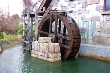 Water mill wheel on river