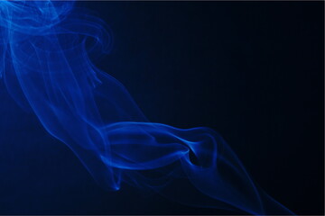 Fototapeta premium soft swirls of smoke created using incense sticks