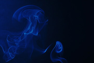 soft swirls of smoke created using incense sticks