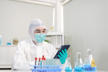 Fototapeta premium person holds 1 tablet another person holding Blood vessels take notes Chemical blood.