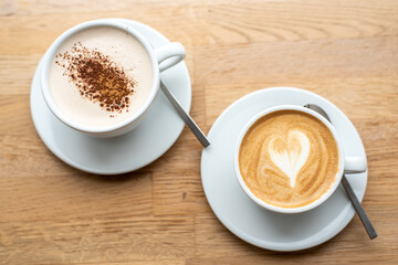 cup of coffee on wooden table