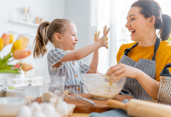 Happy family in the kitchen.