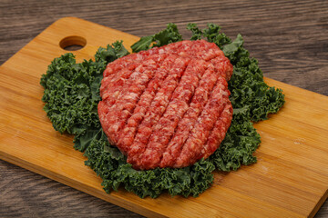 Raw beef burger cutlet for cooking