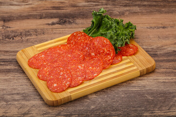 Italian spycy pepperoni sausage slices