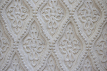 Texture of a white wall with a pattern