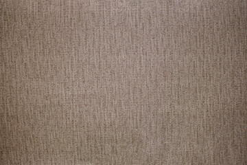 Fototapeta na wymiar Light grey woolen or tweed fabric for grunge background