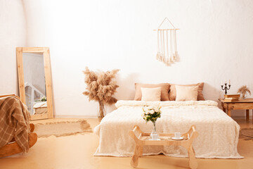 Interior, bedroom, photo studio. Beige brown fashionable. Pampas. Plants are flowers. copy space DIY mocup