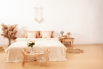Interior, bedroom, photo studio. Beige brown fashionable. Pampas. Plants are flowers. copy space DIY mocup
