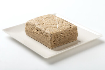 Vegetable-based halva sweet prepared from seeds on white