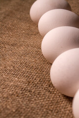 nest with eggs on a sackcloth. Happy Easter eggs. Background with easter eggs.
