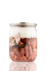 glass jar with meat stew, home-made eco-friendly products, advertising photo billet for your design close-up, Canned meat in a glass jar with reflection